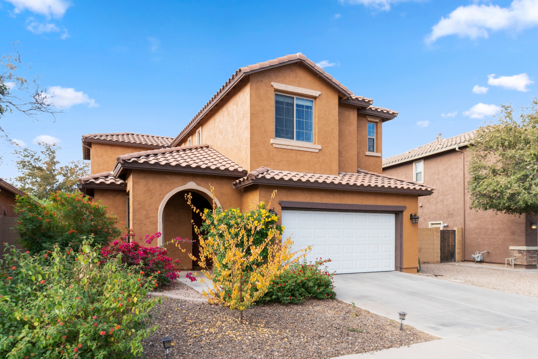 Phoenix, Arizona home with a two-car garage door serviced by Stellar Garage Doors